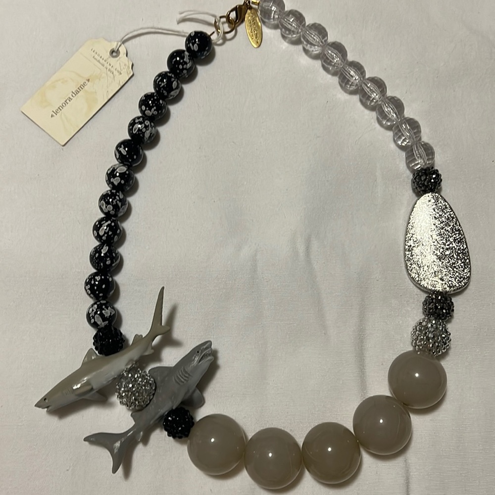 Brand new “shark” necklace.